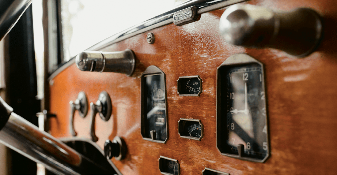 Valencia, Spain - December 8, 2018: Wooden dashboard of an old vintage car.