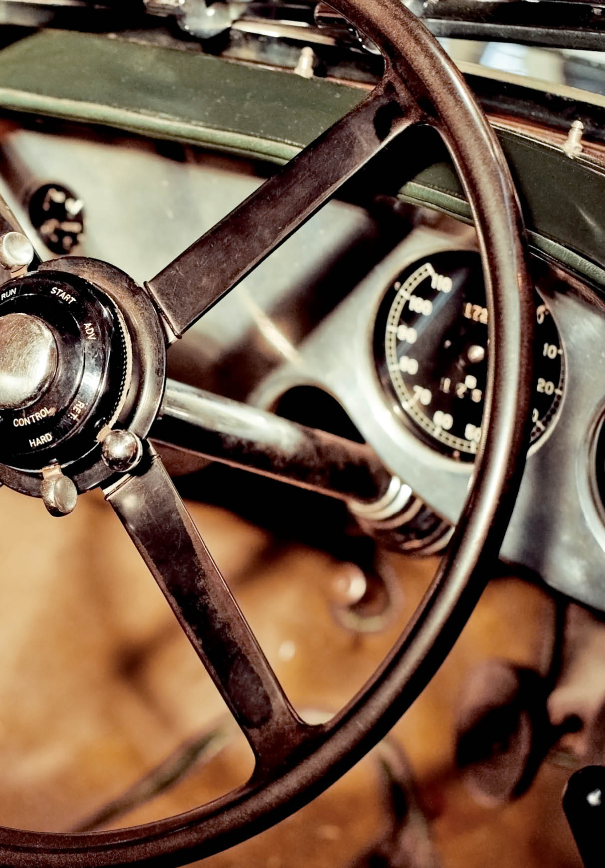 grunge effect classic car steering wheel and dash
